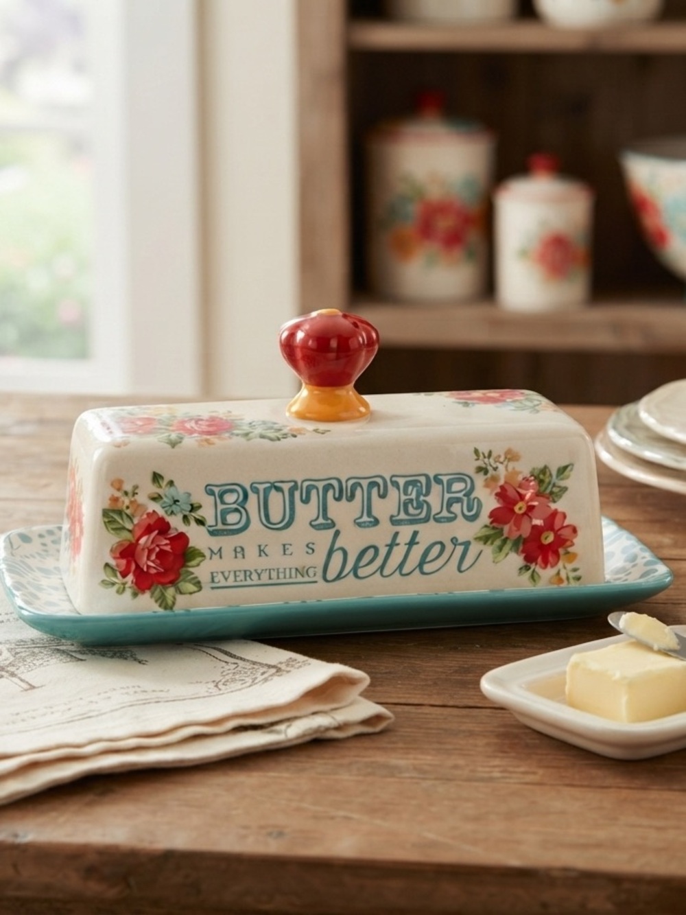 The Pioneer Woman Vintage Floral Butter Dish made of stoneware.